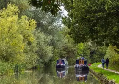 Narrowboats beside the Coventry Canal towpath